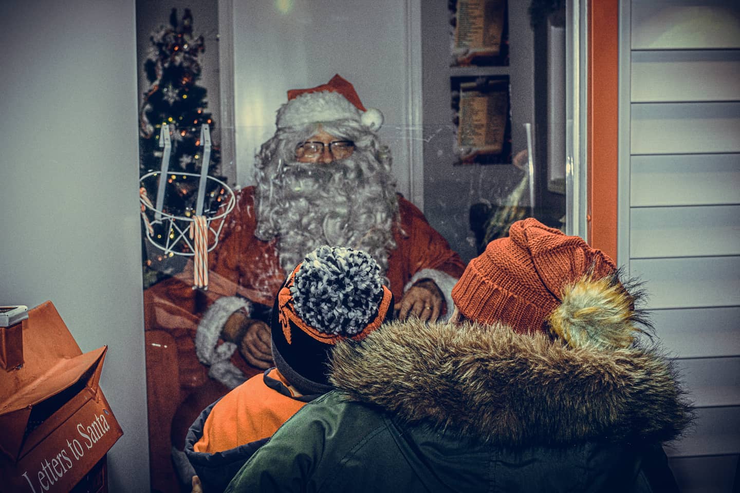 Mom and Son Photo with Santa